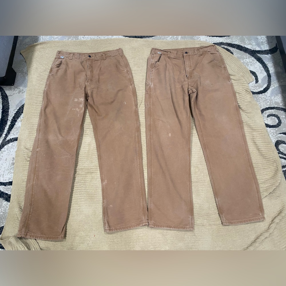 Carhartt flame resistant work pants. Size 38x34 (2 pair) tan
